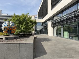 The Biotech 2 building in Belval, with a sculpture on the forecourt