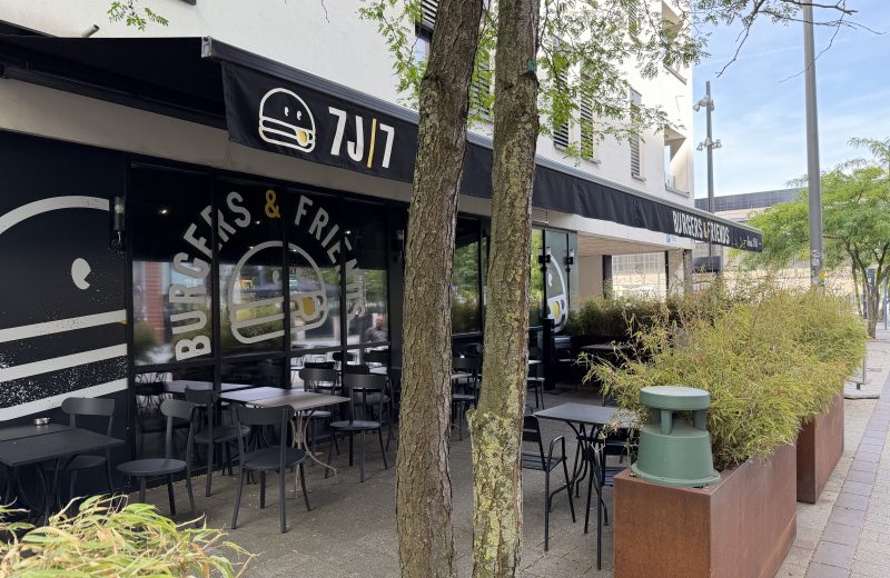The terrace and dark frontage of Burgers & Friends in Belval