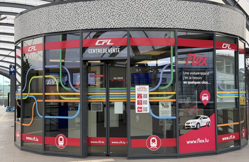 The curved glass front of the CFL ticket office at Belval-Université station