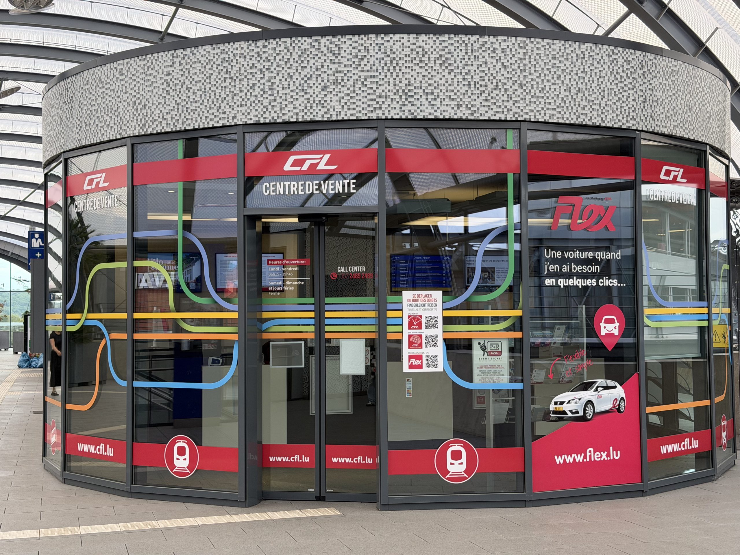 The curved glass front of the CFL ticket office at Belval-Université station