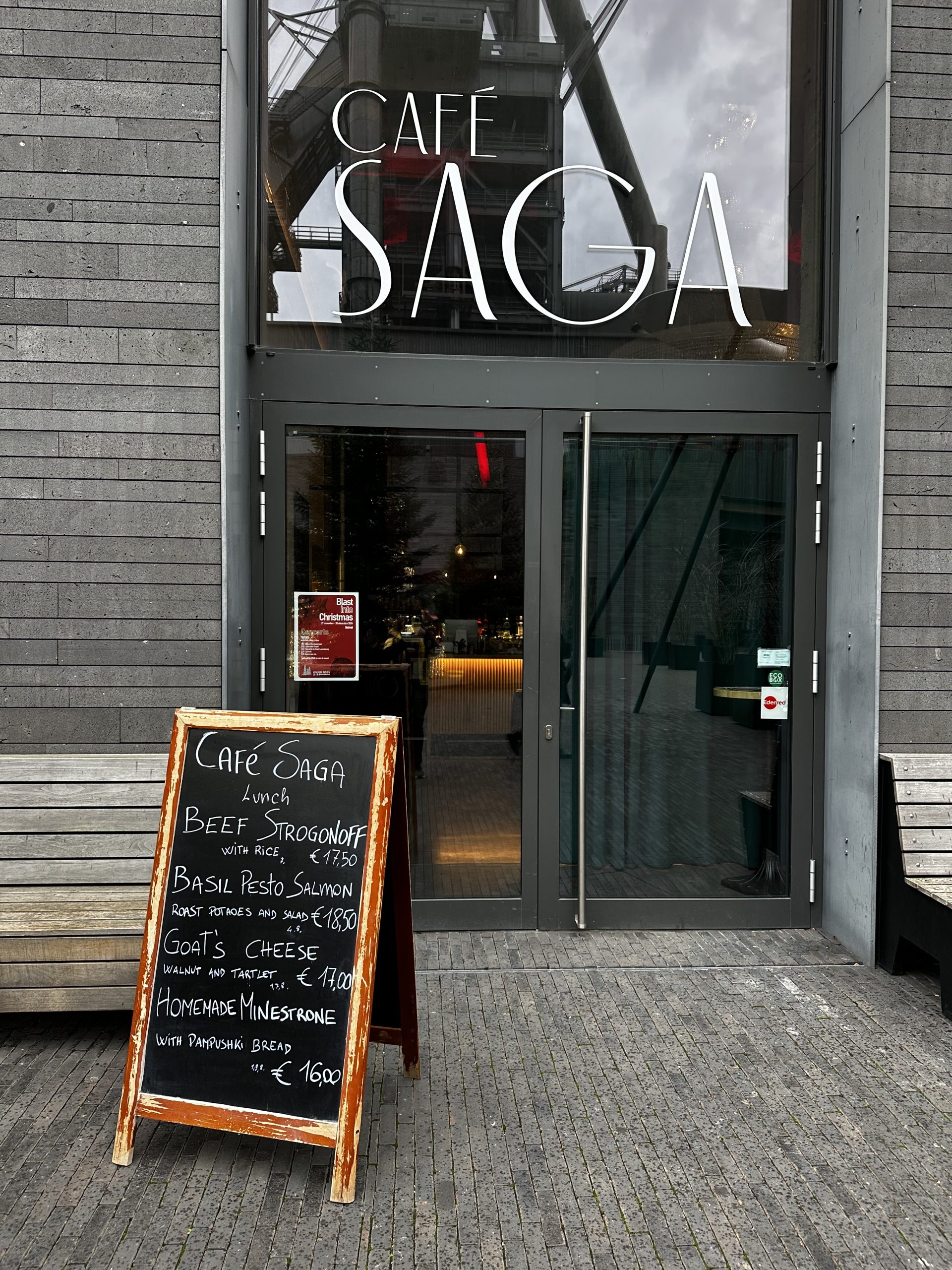 The Café Saga entrance in Belval, with a chalkboard menu outside