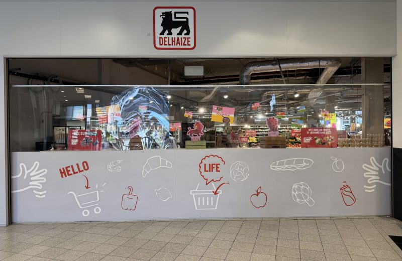 The Delhaize Belval entrance behind renovation hoarding in Belval Plaza