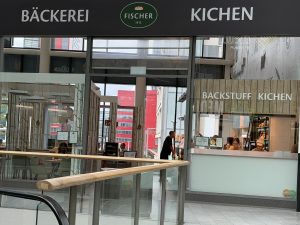 The Fischer bakery counter in Belval Plaza, under its Bäckerei and Kichen signs