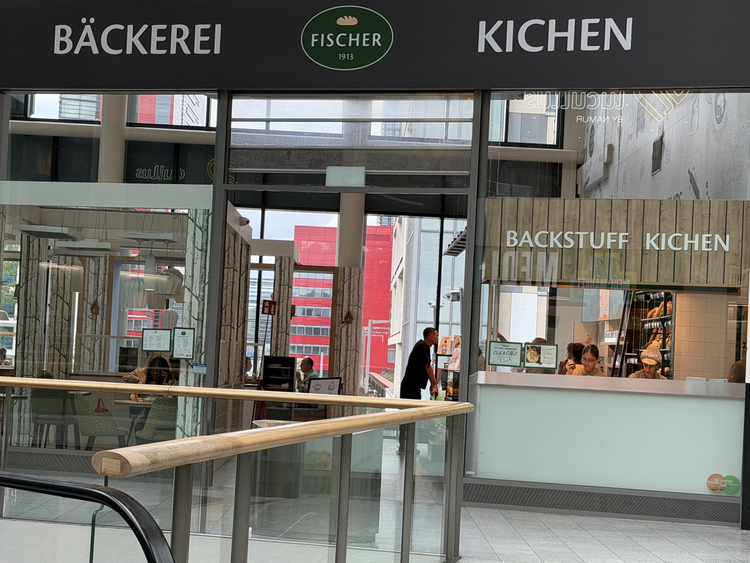 The Fischer bakery counter in Belval Plaza, under its Bäckerei and Kichen signs