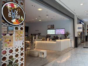 The LuxBoba counter in Belval Plaza, under its round logo