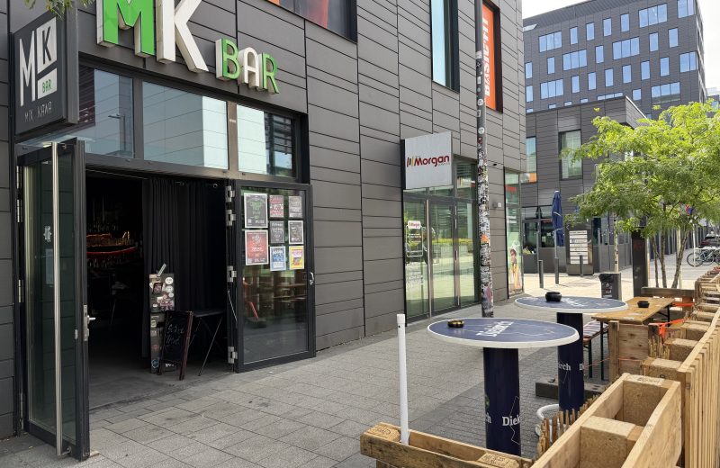 The MK Bar entrance in Belval, with planters along the front