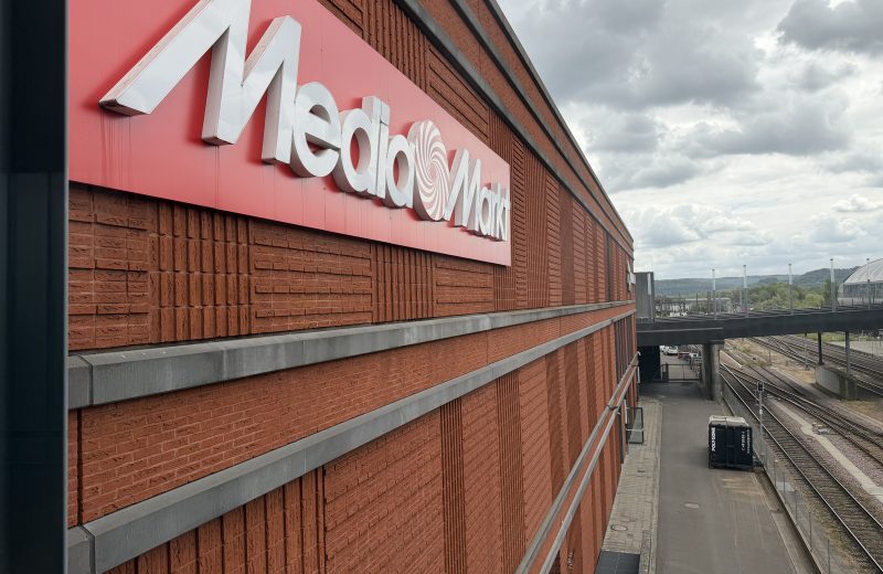 The MediaMarkt sign on the building beside the railway in Belval