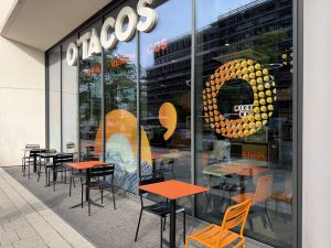 The O'Tacos shopfront in Belval, with tables outside