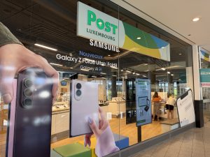 The Espace POST shopfront in Belval Plaza, under its green sign