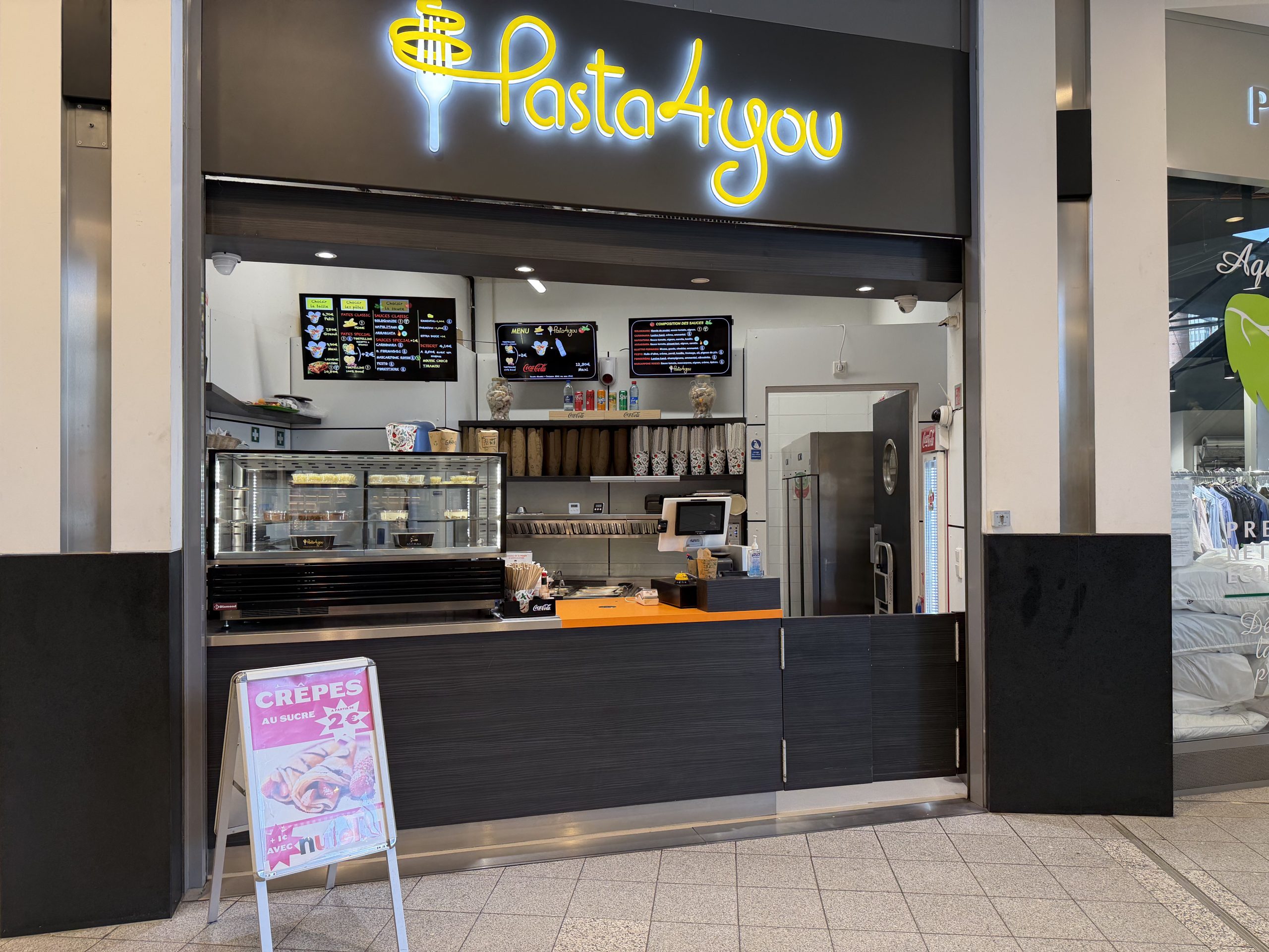 The Pasta4You counter in Belval Plaza, under its sign