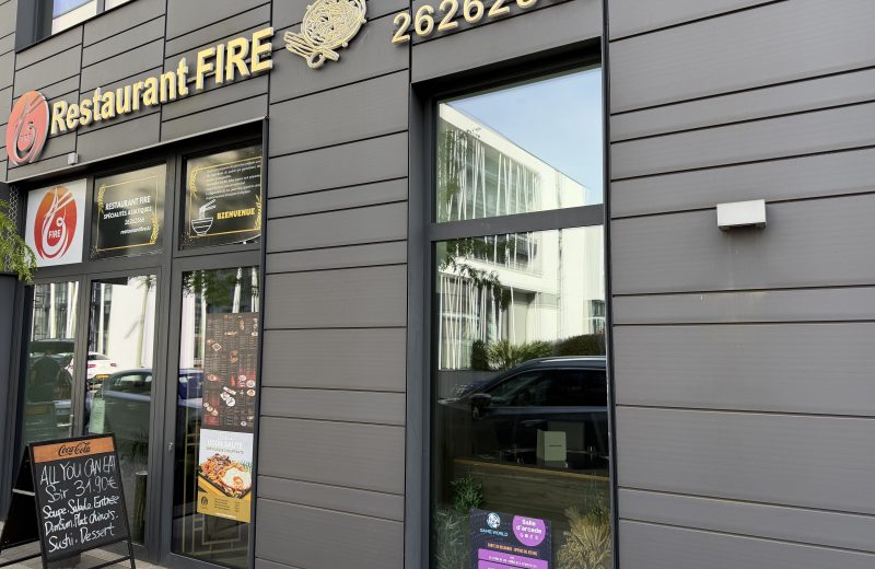 The Restaurant Fire frontage in Belval, with its sign and phone number