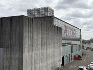 Side view of the Rockhal concert venue in Belval beneath a cloudy sky