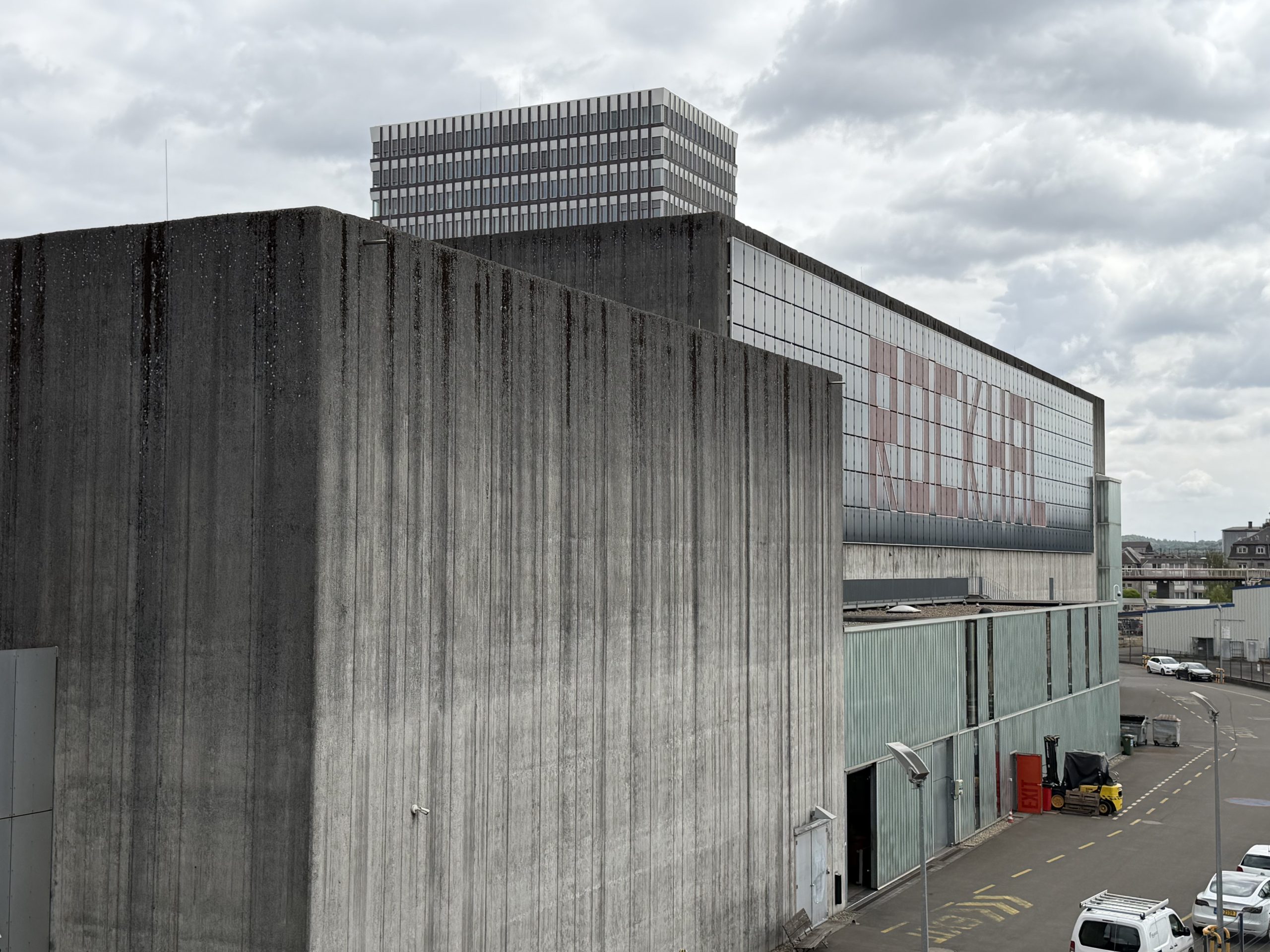 Side view of the Rockhal concert venue in Belval beneath a cloudy sky