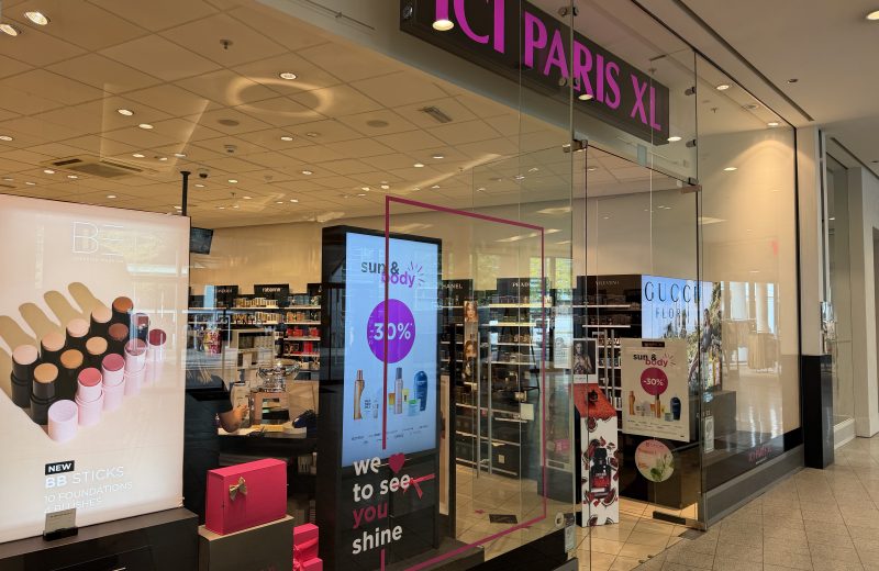 The ICI PARIS XL shopfront in Belval Plaza, with the pink ICI PARIS XL sign above the entrance and perfume bottles and BB stick displays visible through the glass.