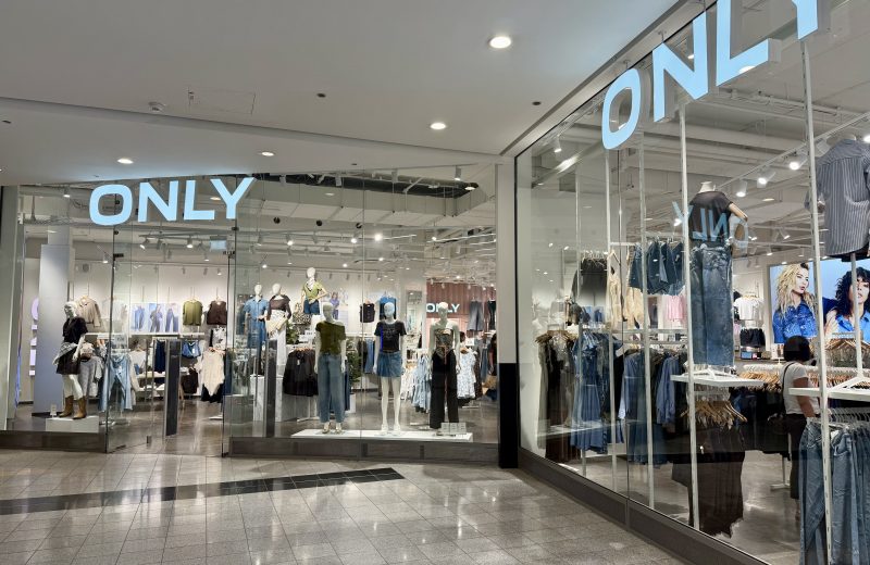 The ONLY shopfront in Belval Plaza, with the pale blue ONLY sign above the entrance and denim skirts, jeans and jackets displayed on mannequins in the window.