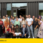 Guests gathered outside MyCaffé in Belval for the 21st #AfterWorkNoWork, with Aswin Lutchanah crouching at the front.