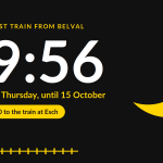 19:56 in large white figures on black, with a yellow crescent moon. The last train from Belval, Monday to Thursday, until 15 October.