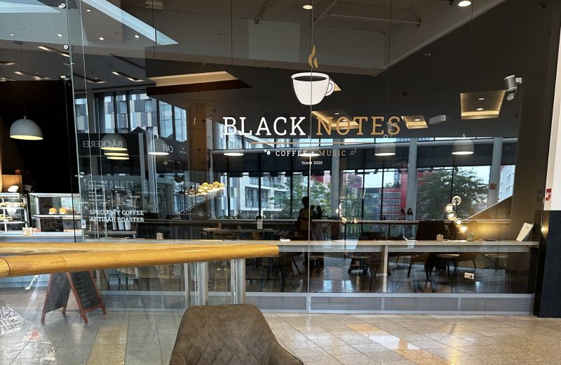 Inside Black Notes Coffee Roasters in Belval, looking towards the counter