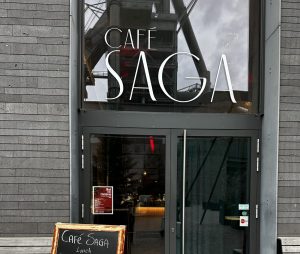 The Café Saga entrance in Belval, with a chalkboard menu outside
