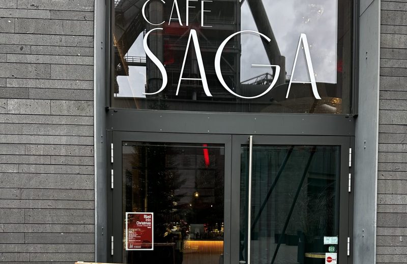 The Café Saga entrance in Belval, with a chalkboard menu outside