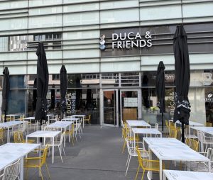 The Duca & Friends terrace in Belval, with parasols set out in front
