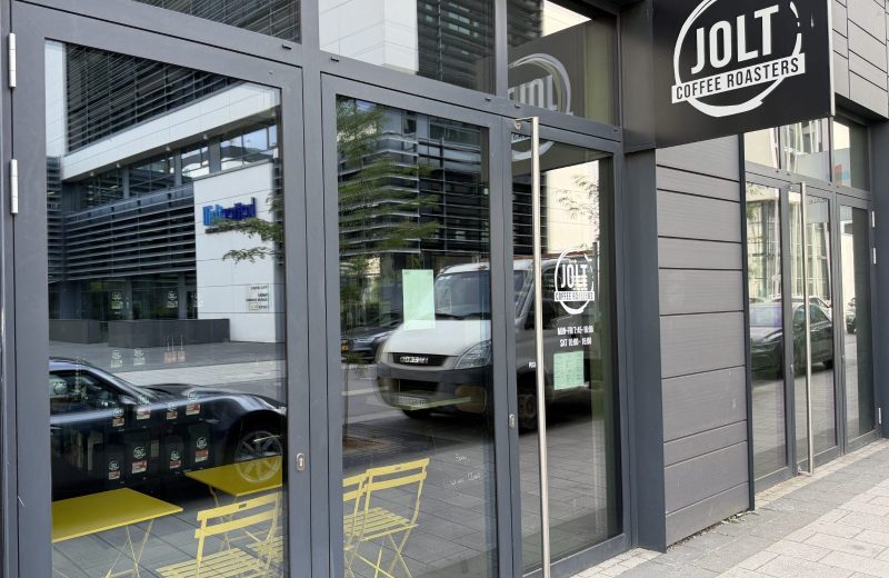 The Jolt Coffee frontage in Belval, with its round sign above the window