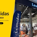 La vitrine de Leonidas au Belval Plaza, son nom éclairé sur une enseigne marine et une vitrine d’automne, à côté d’un panneau jaune I Love Belval : Nouveau, Leonidas, Belval Plaza.