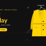 Illustration of a yellow winter coat on a hanger in front of the silhouette of the Belval blast furnace, next to the words "Coat Sunday", Mantelsonndeg at Belval Plaza, the shops are open from 10:00 to 18:00, Sunday 25 October.
