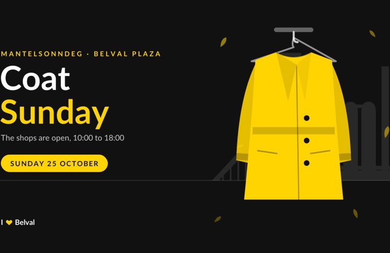 Illustration of a yellow winter coat on a hanger in front of the silhouette of the Belval blast furnace, next to the words "Coat Sunday", Mantelsonndeg at Belval Plaza, the shops are open from 10:00 to 18:00, Sunday 25 October.
