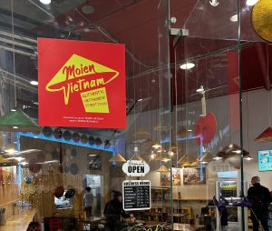 Inside Moien Vietnam in Belval Plaza, seen through the glass front