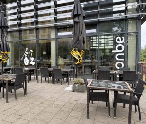 The Nonbe terrace in Belval, under its vertical sign