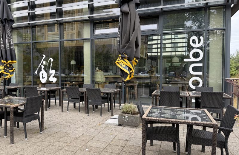 The Nonbe terrace in Belval, under its vertical sign