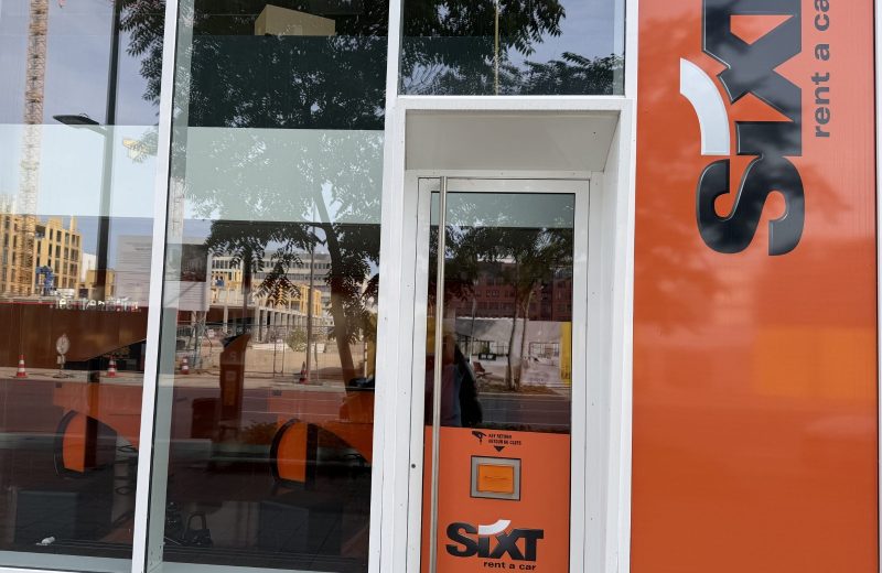 The Sixt car hire branch on boulevard du Jazz in Belval, with the orange Sixt frontage and a key return box beside the door.